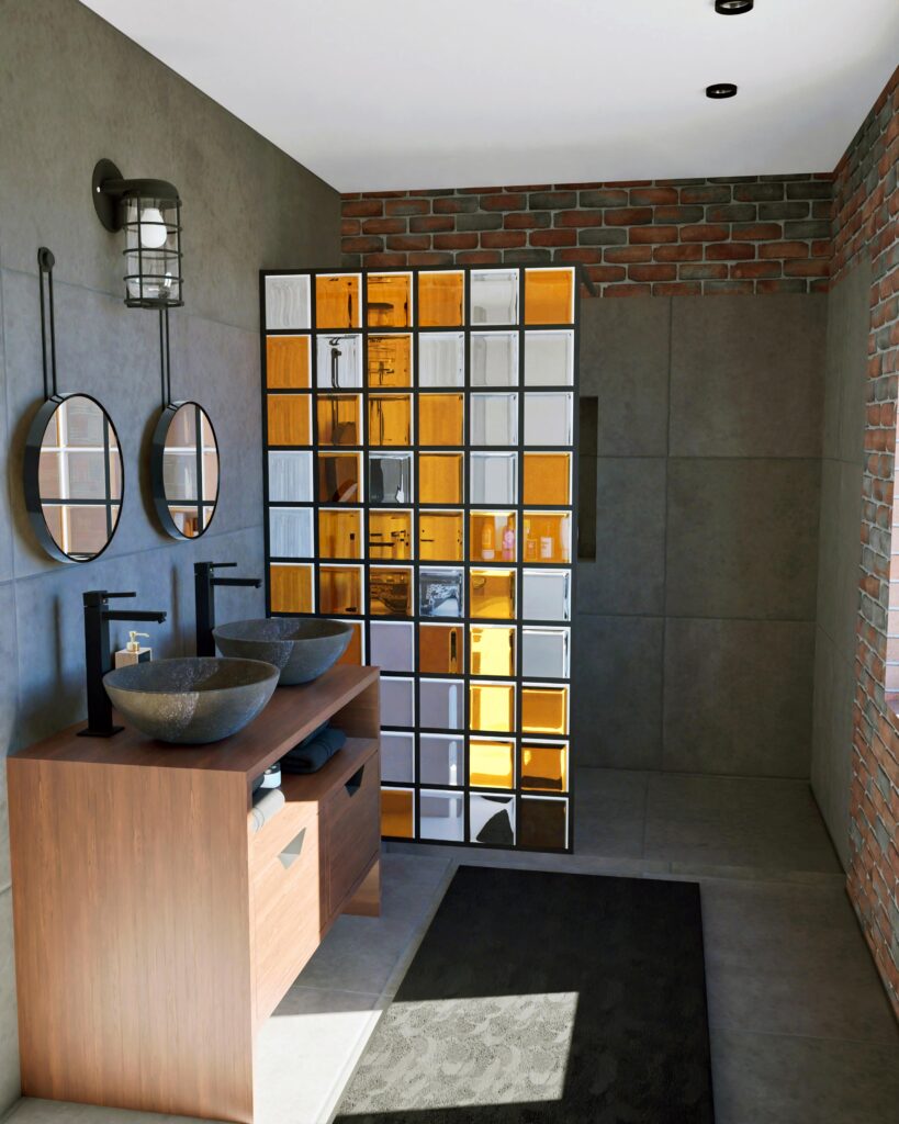 Salle de bain urbaine avec mur en briques et paroi en pavés de verre orange et blanc – Studio AB Origin