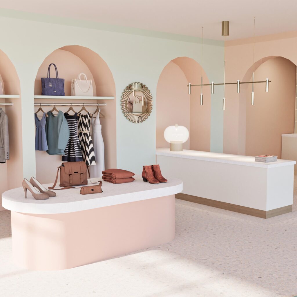 Boutique design avec arches pastel, mobilier vintage, sacs et vêtements exposés, fauteuil imprimé et suspension laiton – Studio AB Origin, architecte d’intérieur